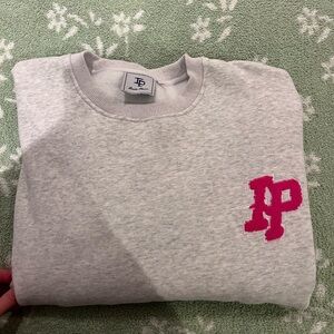 Inaka Power Gray Sweatshirt with Pink Logo